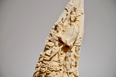 A Chinese carved ivory tusk with a marriage scene, ca. 1900
